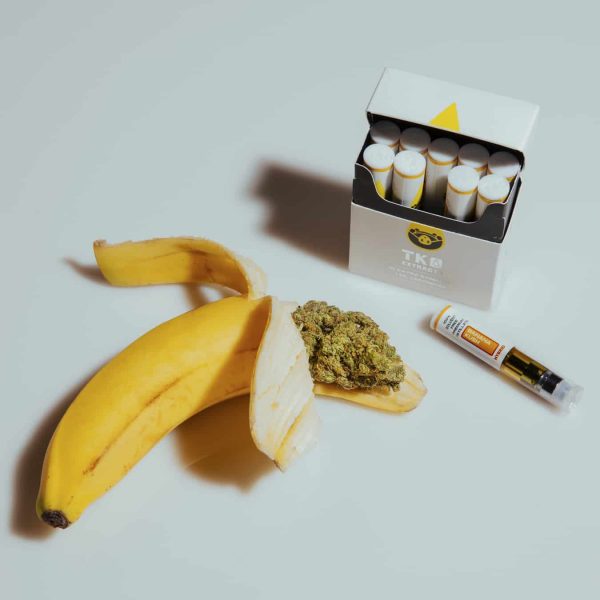 tk extracts vape box and cannabis inside pealing of banana