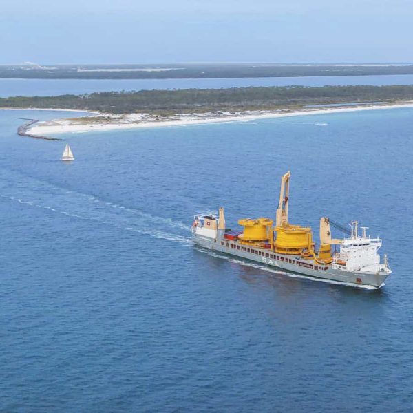 aerial of a ship leaving a port