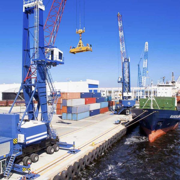 a crane and ship on a port in Florida